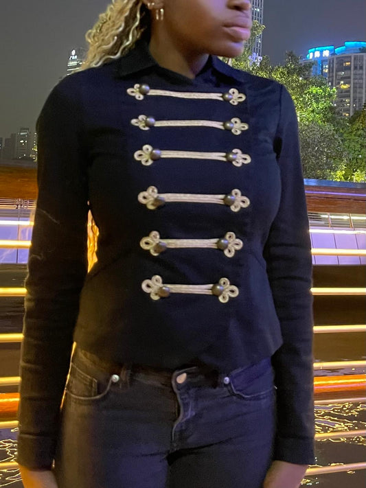 black military-style fitted jacket with gold detailing