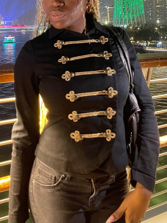 black military-style fitted jacket with gold detailing